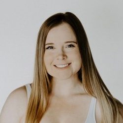 Headshot of the owner, warm and real